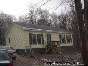 1320 Maple Grove Road Moscow, PA 18444 - Photo 1 of 1 a view of house with backyard
