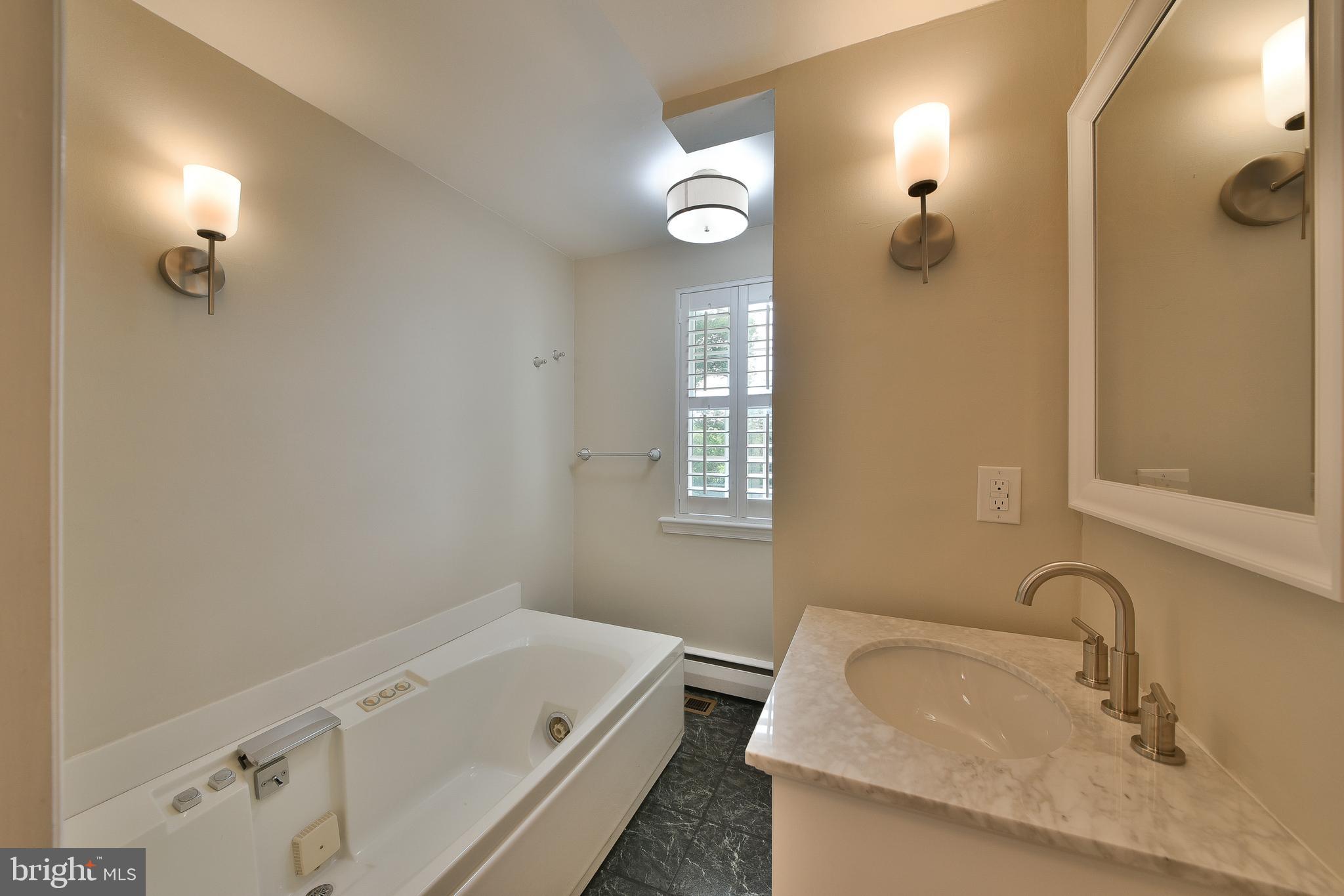 6113 West Mill Road Flourtown, PA 19031 - Photo 23 of 39 Convenient Main-Level Full Bath