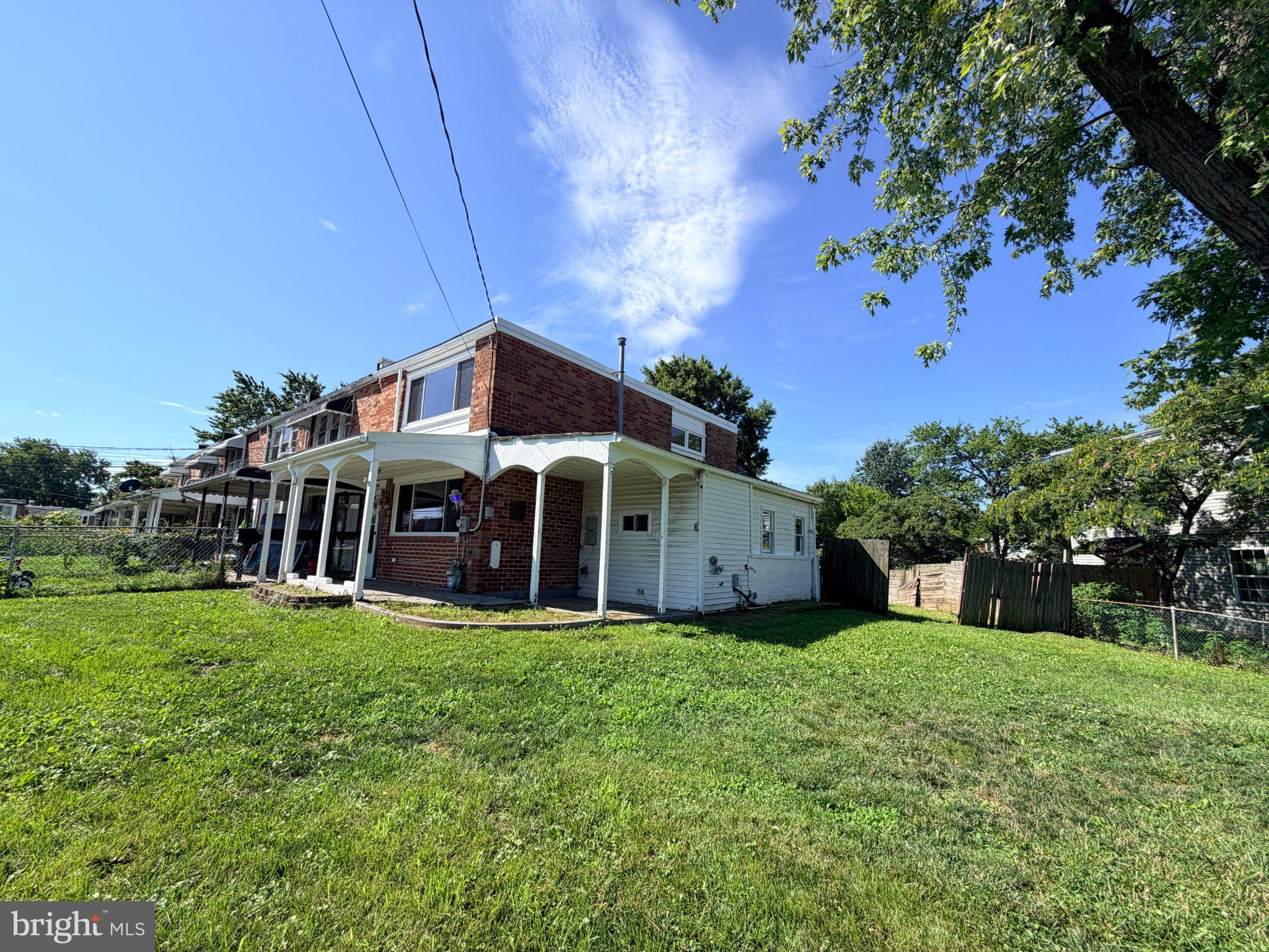 2916 Freeway Halethorpe, MD 21227 - Photo 1 of 18 Charming brick home with lush greenery.