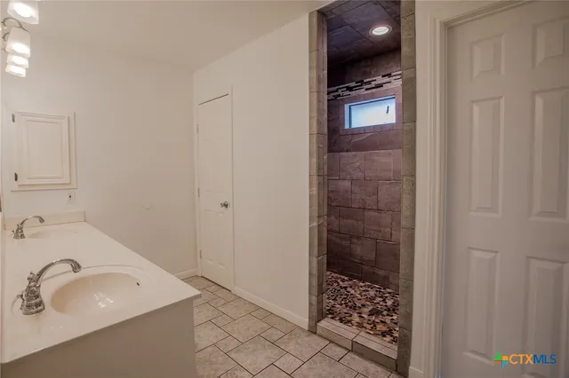 a view of a kitchen with electric appliances