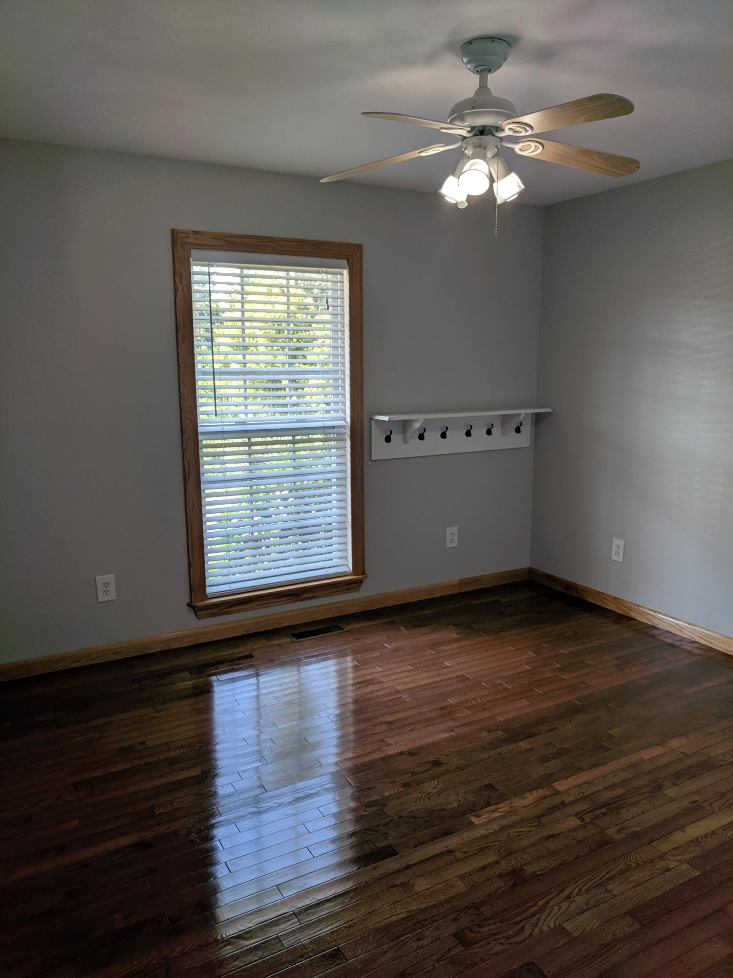 3691 Stockton Valley Road Loudon, TN 37774 - Photo 29 of 38 a view of an empty room with wooden floor and a window