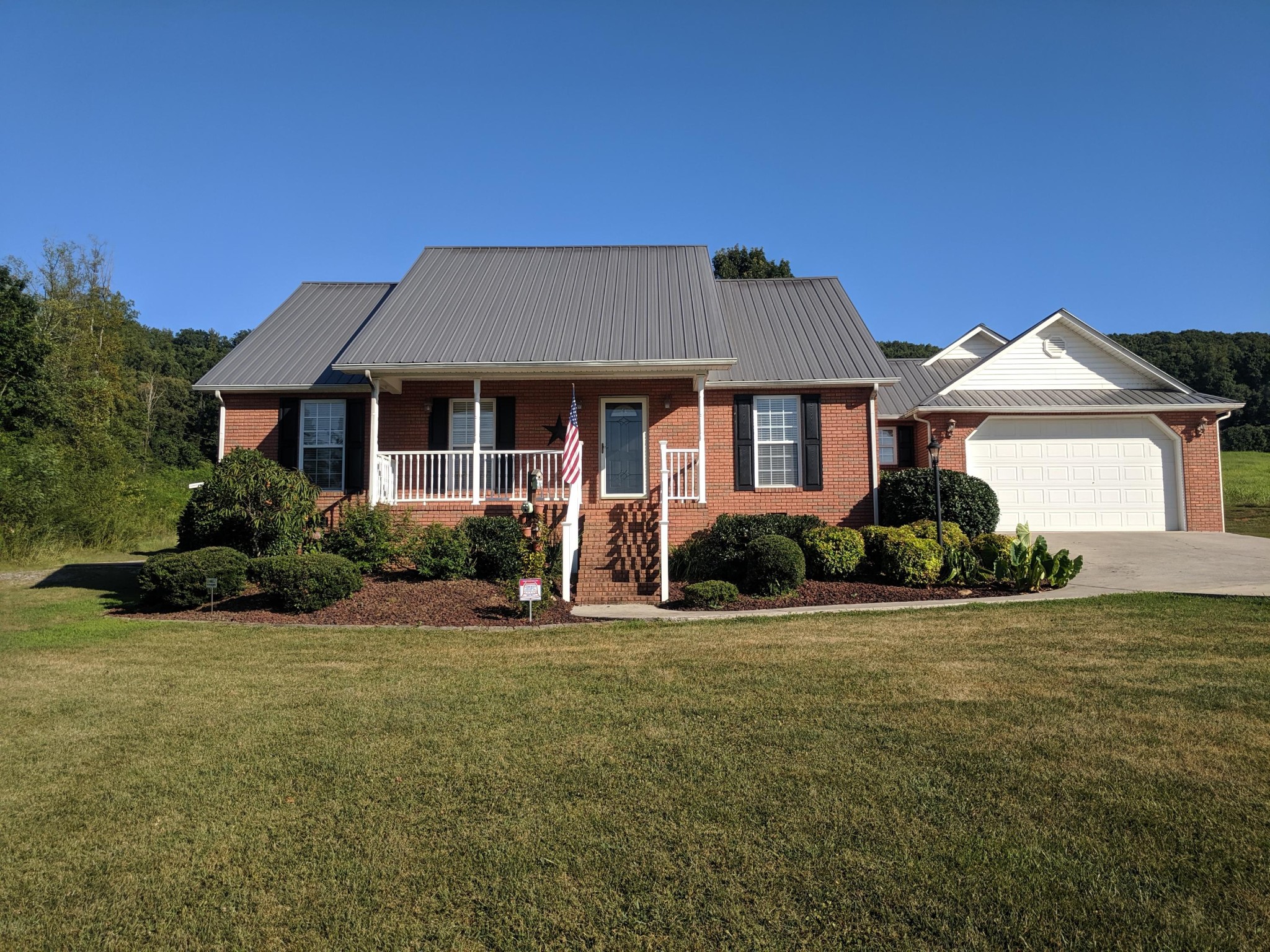 3691 Stockton Valley Road Loudon, TN 37774 - Photo 3 of 38 a front view of a house with a garden