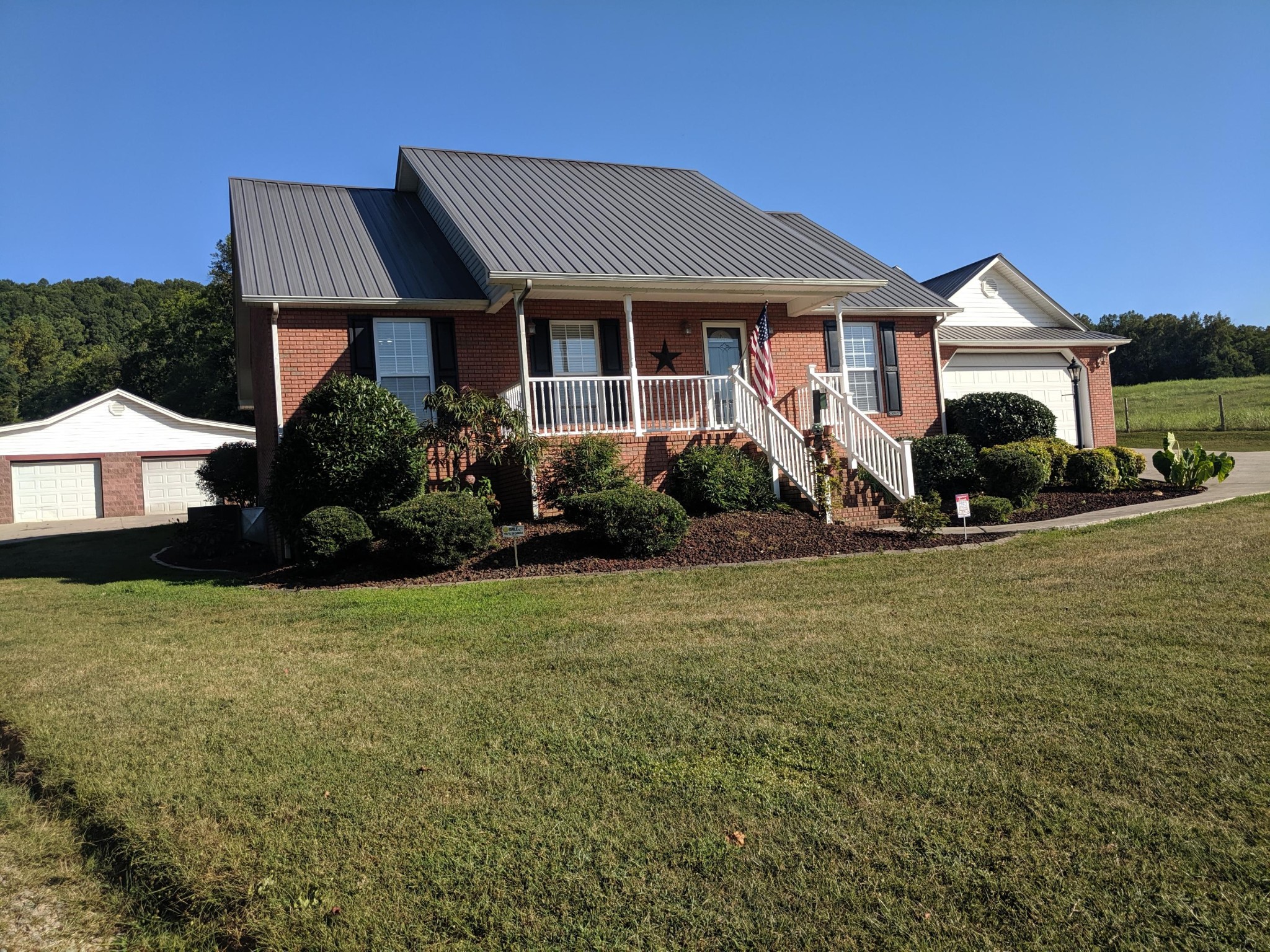 3691 Stockton Valley Road Loudon, TN 37774 - Photo 4 of 38 a front view of a house with a yard