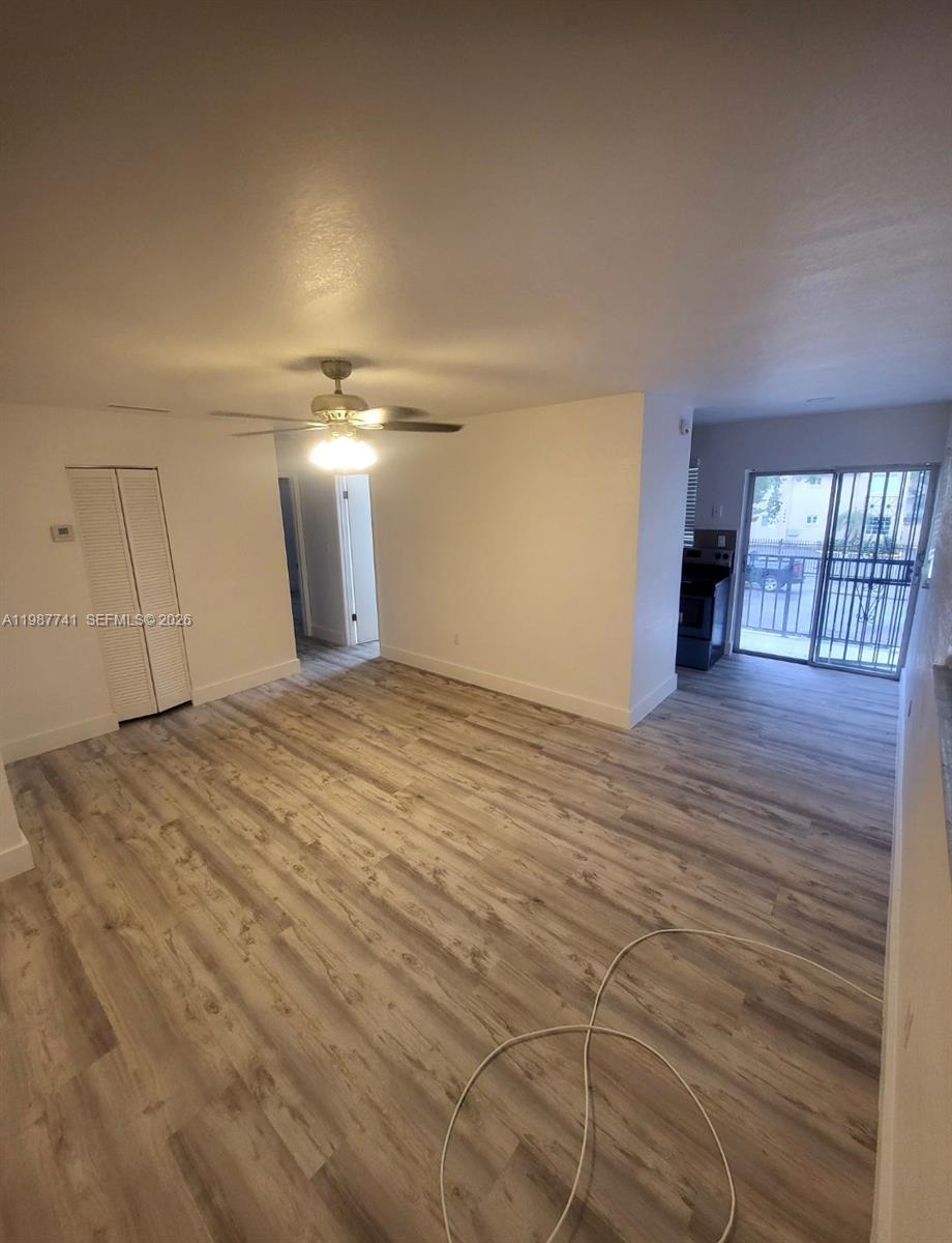 1467 Southwest 3rd Street, Unit 2 Miami, FL 33135 - Photo 11 of 14 a view of empty room with wooden floor