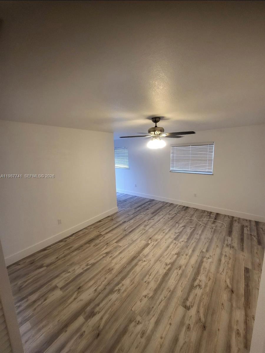 1467 Southwest 3rd Street, Unit 2 Miami, FL 33135 - Photo 12 of 14 wooden floor in an empty room
