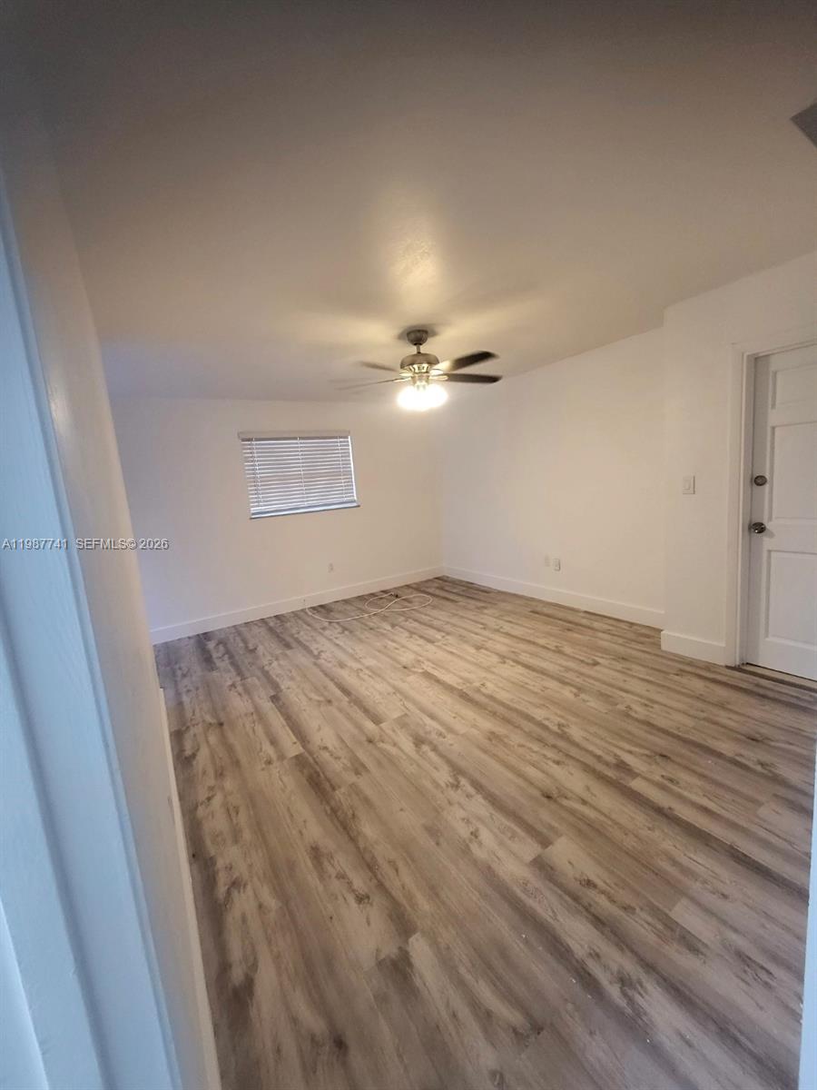 1467 Southwest 3rd Street, Unit 2 Miami, FL 33135 - Photo 2 of 14 wooden floor in an empty room