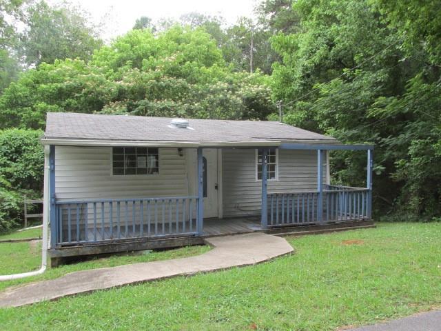 142 Willis Road Southwest Cartersville, GA 30120 - Photo 1 of 1 a view of a house with a yard