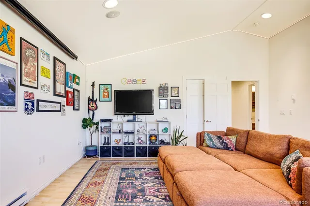 a living room with a flat screen tv