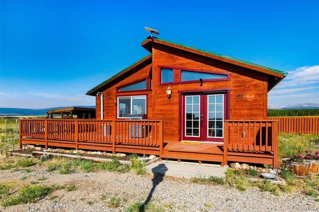 a view of a swimming pool with an outdoor seating