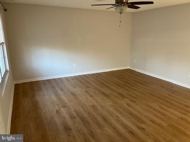 1642 Hilltop Road Edgewater, MD 21037 - Photo 5 of 10 a view of a room with wooden floor