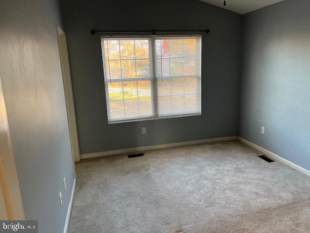 1642 Hilltop Road Edgewater, MD 21037 - Photo 6 of 10 an empty room with a window