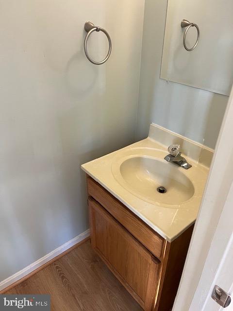 1642 Hilltop Road Edgewater, MD 21037 - Photo 9 of 10 a bathroom with a sink and a mirror
