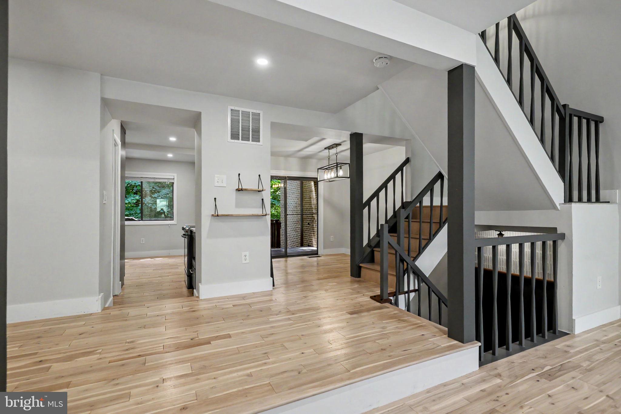 2105 Glencourse Lane Reston, VA 20191 - Photo 74 of 74 Vaulted ceilings deliver open-concept floor plan