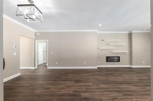 a view of a livingroom with wooden floor