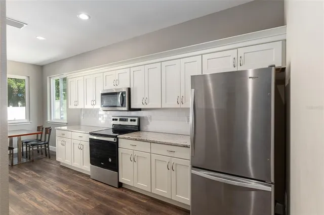 a room with a bed and a window