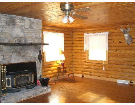 213 Roaring Run Road Champion, PA 15622 - Photo 2 of 18 Living Room. Woodburner