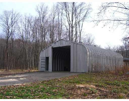 213 Roaring Run Road Champion, PA 15622 - Photo 14 of 18 Other. Door is 20 feet high, building is 28x44 with electricity, concrete floor, and drain.