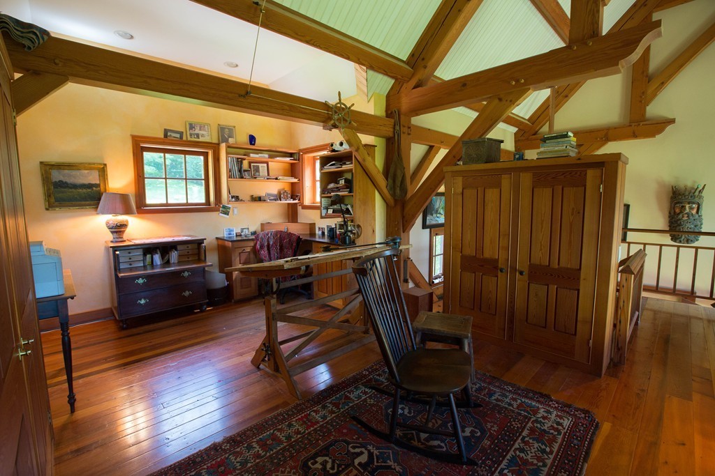 160 George Lamb Road Leyden, MA 01337 - Photo 25 of 30 a room with wooden floor and furniture
