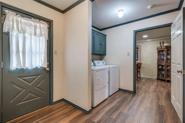 a view of hallway with wooden floor