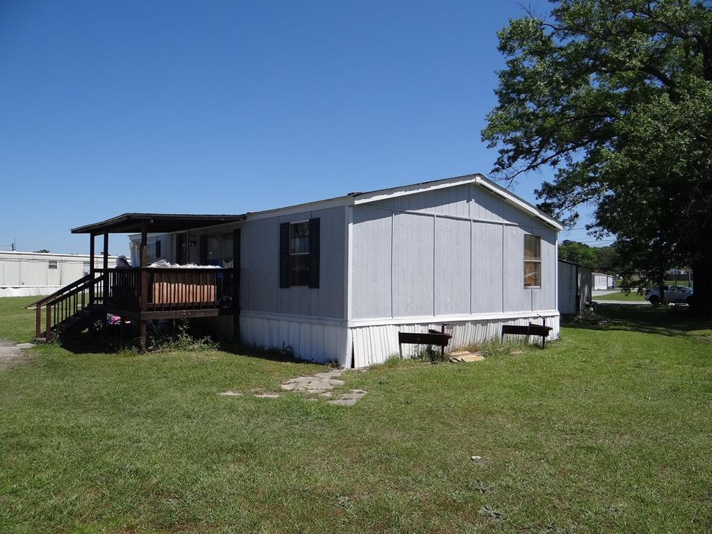 3400 St Marys Road, Unit 450 Columbus, GA 31906 - Photo 1 of 3 a view of a house with backyard