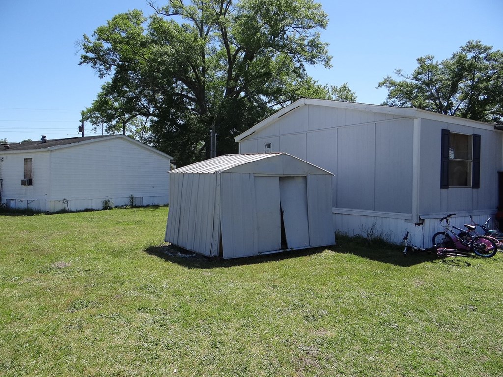 3400 St Marys Road, Unit 450 Columbus, GA 31906 - Photo 3 of 3 a view of a backyard
