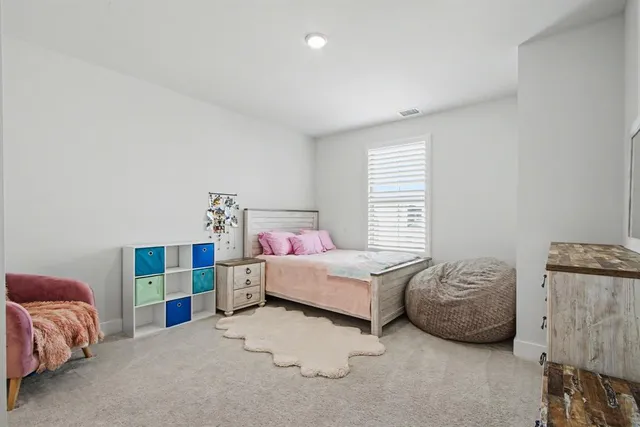 a bathroom with a sink a toilet and bathtub