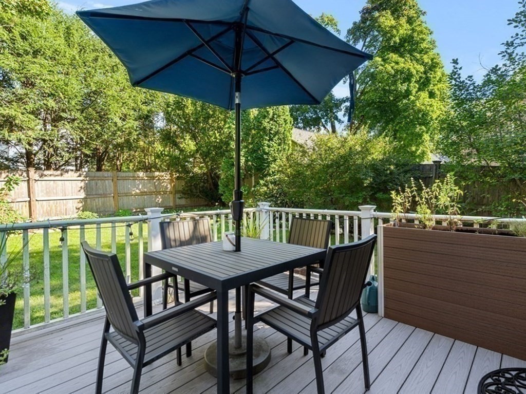 16 Manson Road Needham, MA 02494 - Photo 17 of 34 a view of balcony with wooden floor and outdoor seating