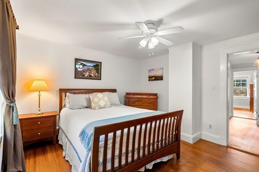 16 Manson Road Needham, MA 02494 - Photo 26 of 34 a bedroom with a bed and wooden floor