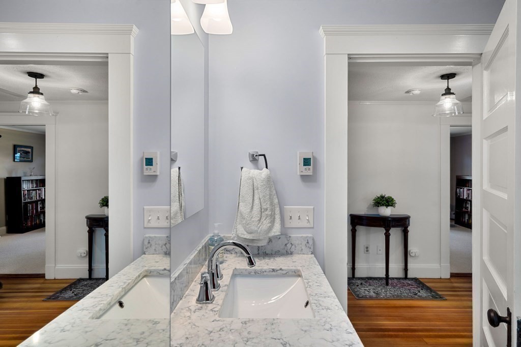 16 Manson Road Needham, MA 02494 - Photo 28 of 34 a bathroom with a sink and a mirror