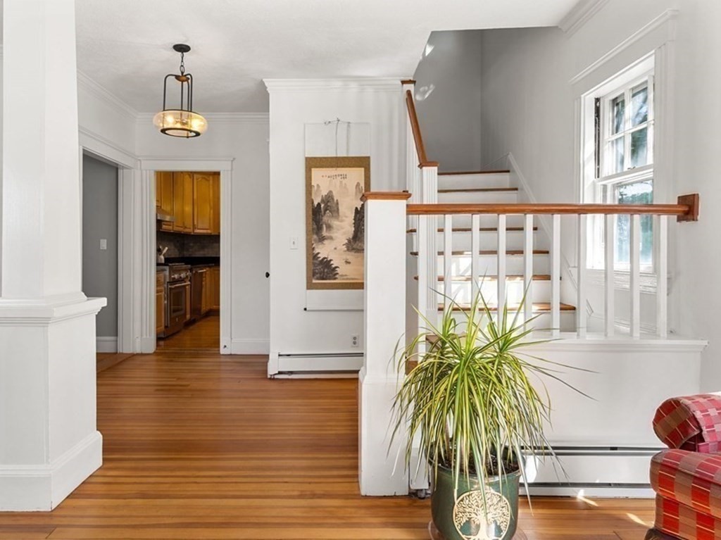 16 Manson Road Needham, MA 02494 - Photo 3 of 34 a hallway with wooden floor and windows