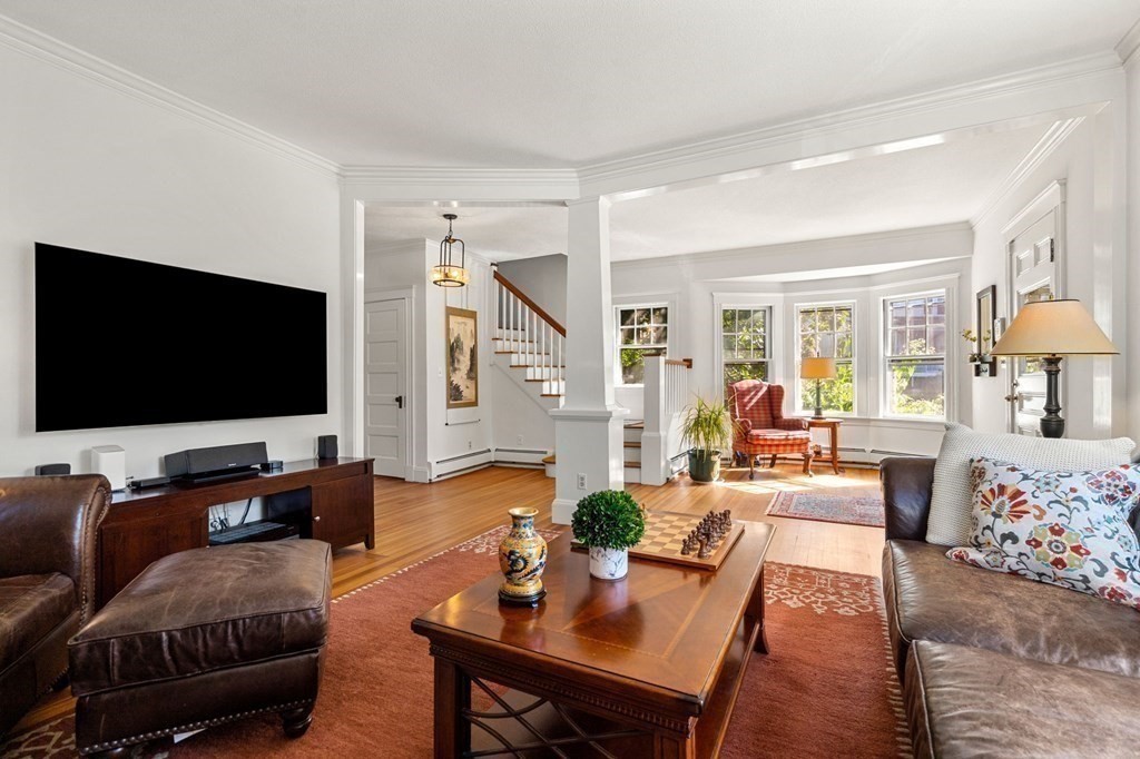 16 Manson Road Needham, MA 02494 - Photo 8 of 34 a living room with furniture and a flat screen tv