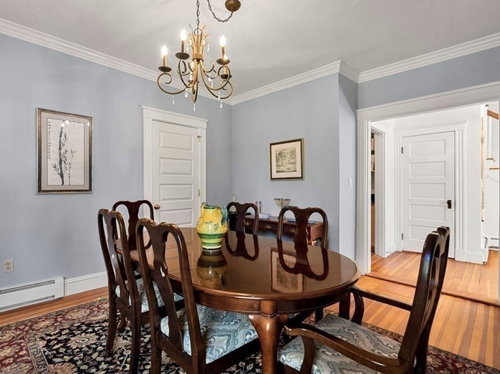 16 Manson Road Needham, MA 02494 - Photo 10 of 34 a view of a dining room with furniture and chandelier
