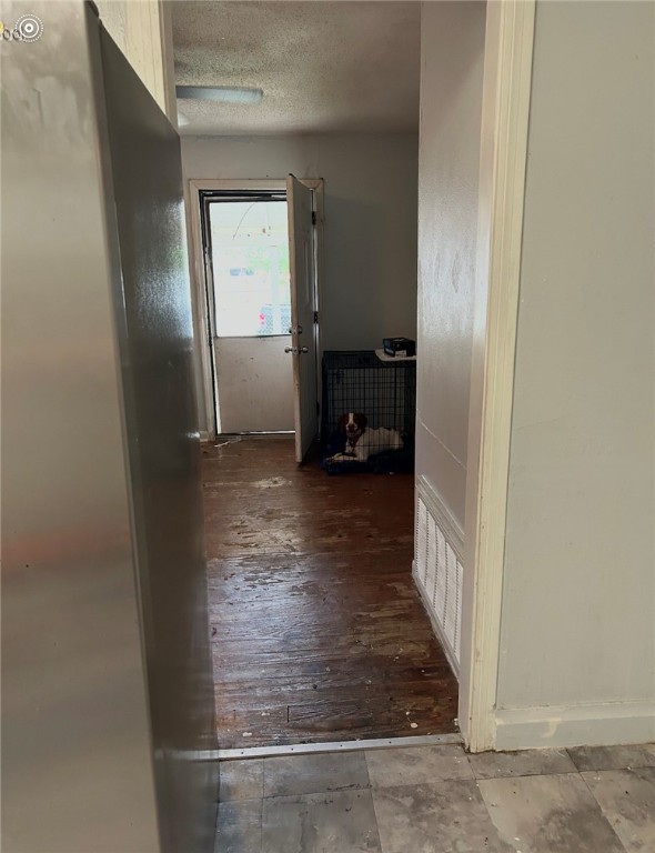 2513 Terrace Street Corpus Christi, TX 78404 - Photo 14 of 24 a view of a hallway view with wooden floor and closet