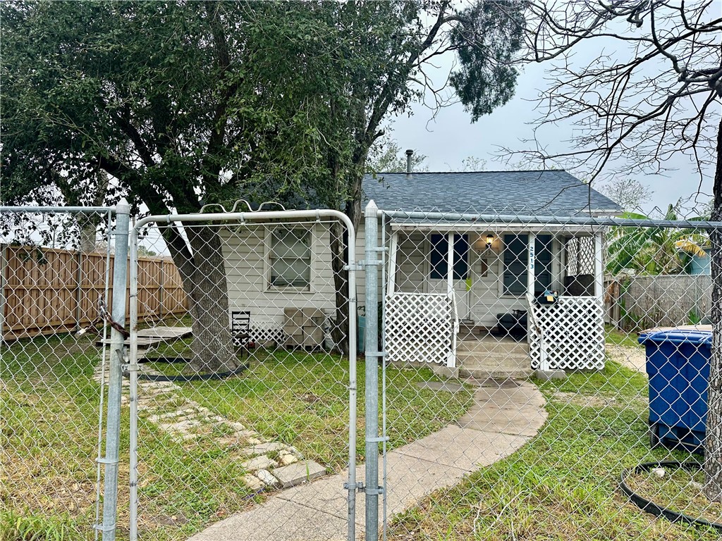 2513 Terrace Street Corpus Christi, TX 78404 - Photo 2 of 24 a front view of a house with garden