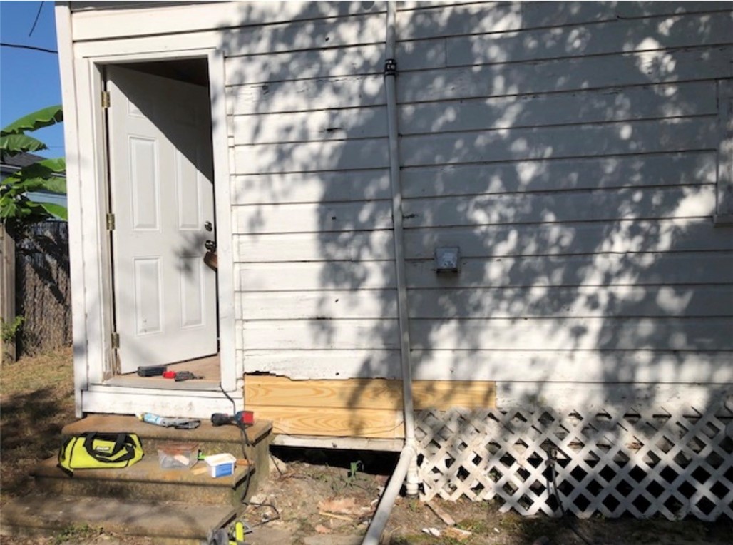 2513 Terrace Street Corpus Christi, TX 78404 - Photo 22 of 24 a bathroom with a sink and a shower curtain