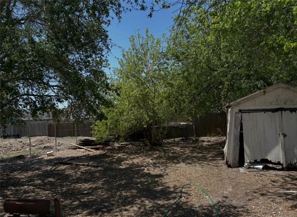 2513 Terrace Street Corpus Christi, TX 78404 - Photo 23 of 24 a backyard of a house with lots of green space