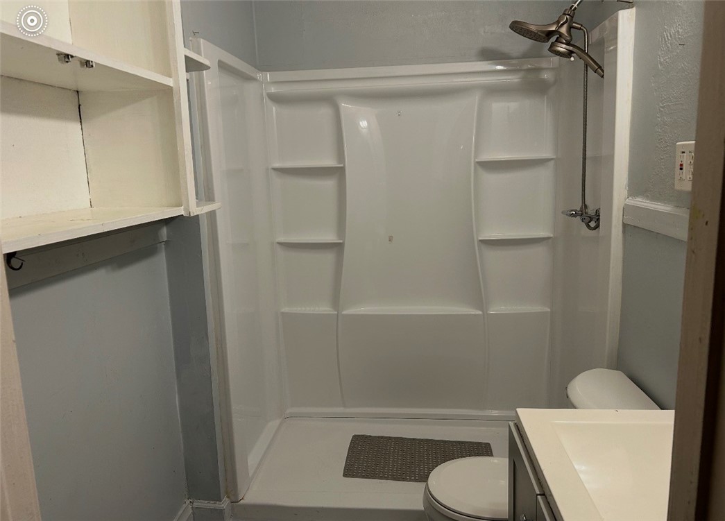 2513 Terrace Street Corpus Christi, TX 78404 - Photo 5 of 24 a bathroom with a toilet and a shower