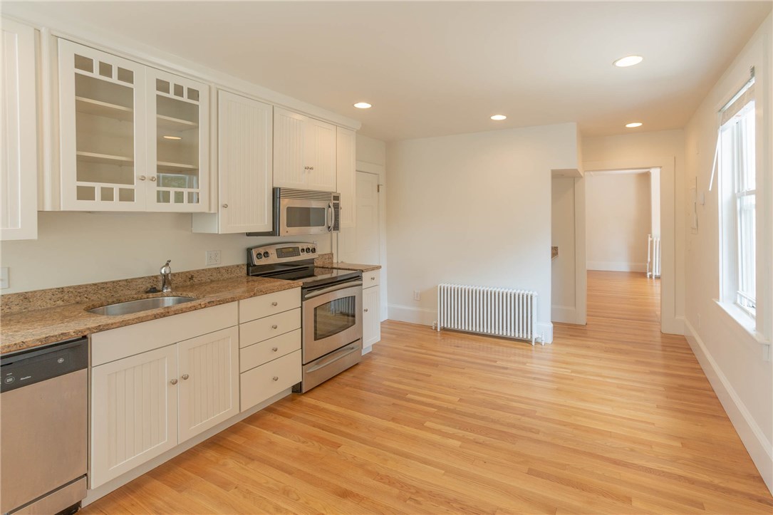 51 Annandale Road Newport, RI 02840 - Photo 13 of 22 Kitchen with Refinished Hardwood, Recessed Lighting and Newly Painted