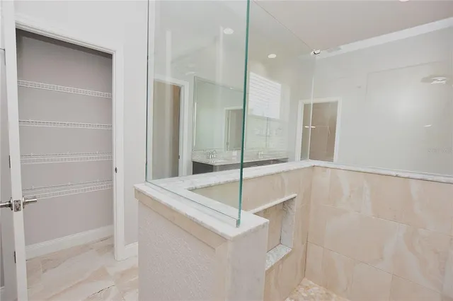 a bathroom with a sink and a shower