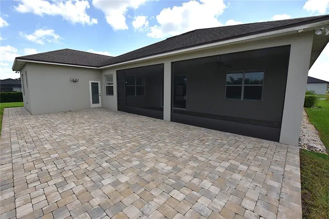 a view of a backyard with a garden