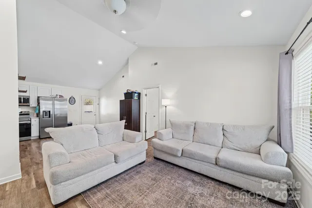a living room with furniture and a couch