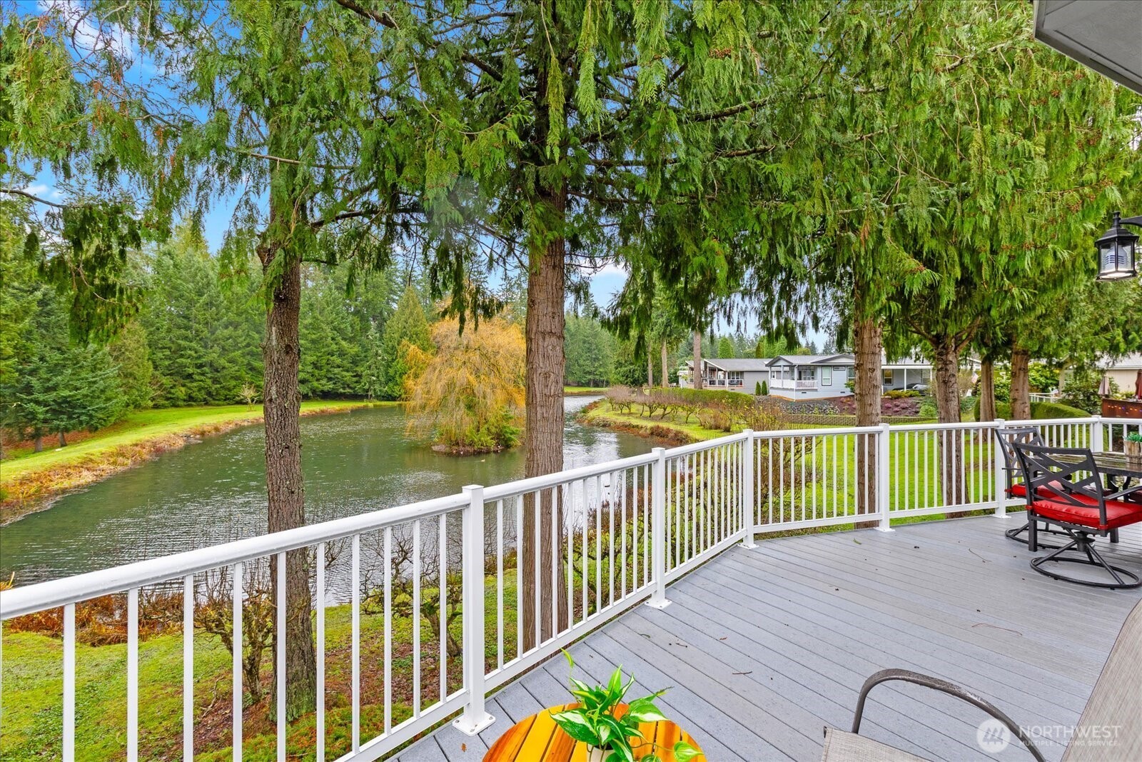 23825 15th Avenue Southeast, Unit 169 Bothell, WA 98021 - Photo 1 of 25 a view of a deck with a backyard