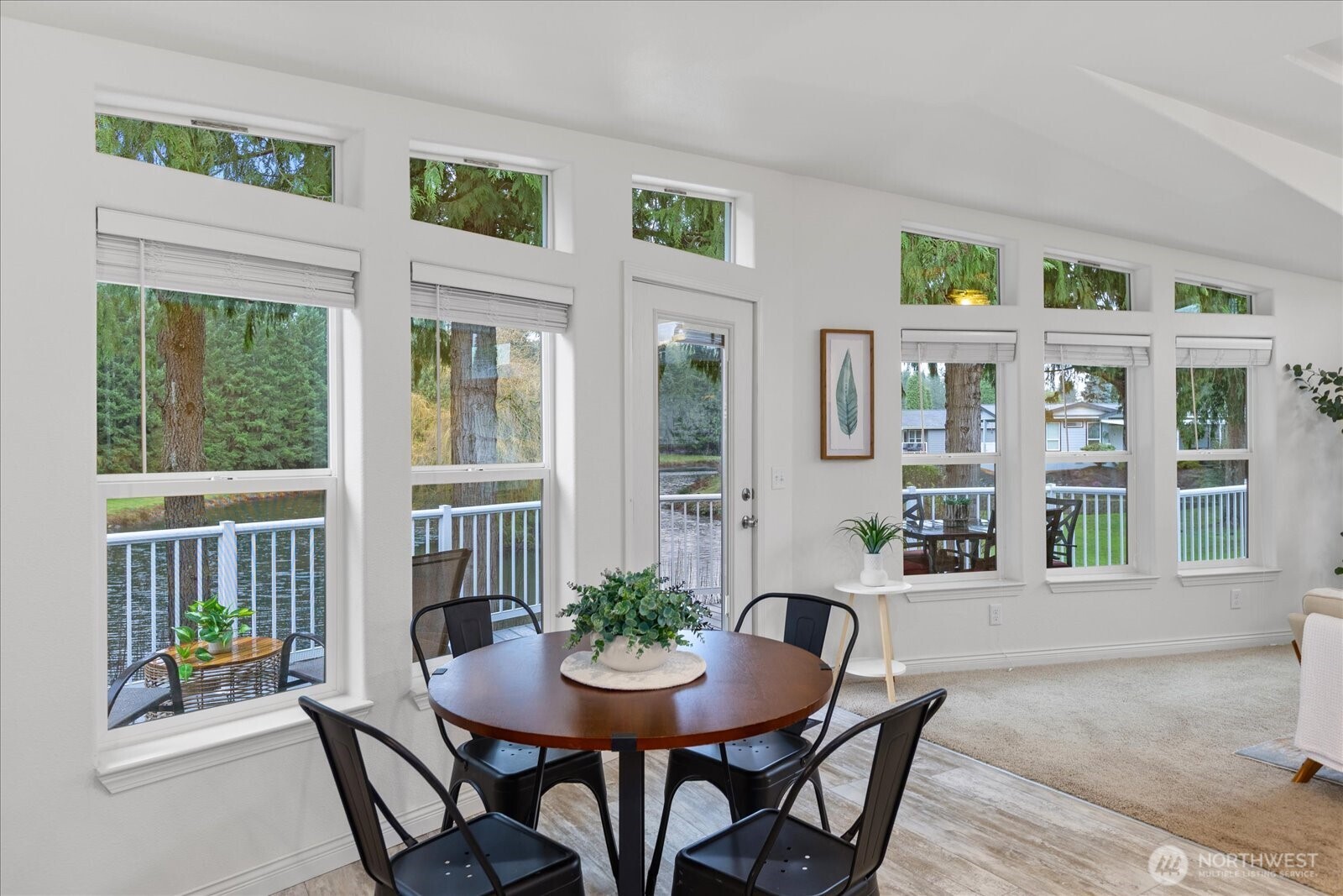 23825 15th Avenue Southeast, Unit 169 Bothell, WA 98021 - Photo 14 of 25 a view of a dining room with furniture window and wooden floor