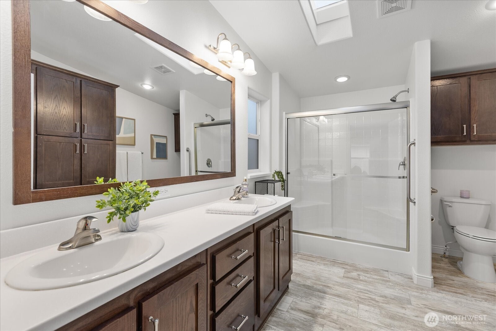 23825 15th Avenue Southeast, Unit 169 Bothell, WA 98021 - Photo 16 of 25 a bathroom with a sink and a mirror