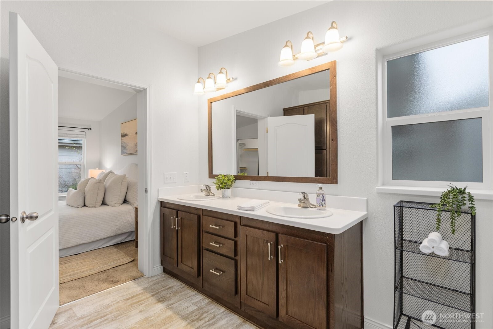 23825 15th Avenue Southeast, Unit 169 Bothell, WA 98021 - Photo 17 of 25 a en suite bathroom with a double vanity sink and a mirror
