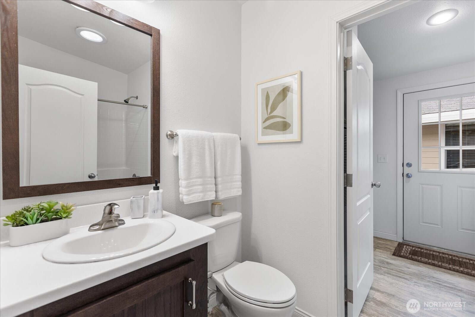 23825 15th Avenue Southeast, Unit 169 Bothell, WA 98021 - Photo 20 of 25 a bathroom with a sink a toilet and shower