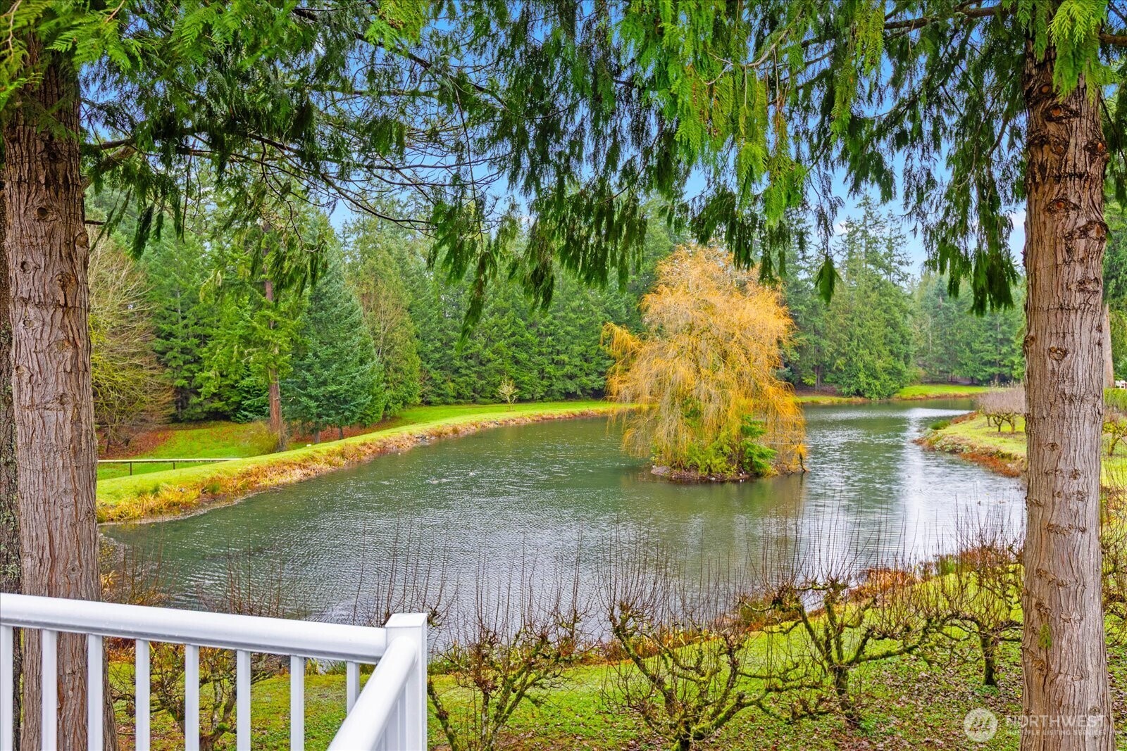 23825 15th Avenue Southeast, Unit 169 Bothell, WA 98021 - Photo 23 of 25 a view of a lake from a yard