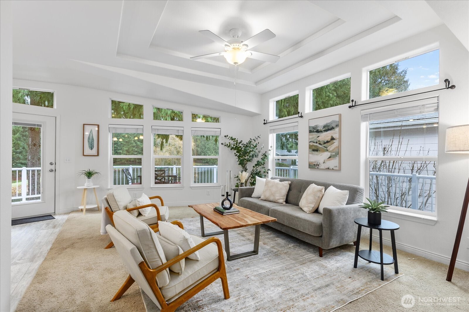 23825 15th Avenue Southeast, Unit 169 Bothell, WA 98021 - Photo 3 of 25 a living room with furniture and a large window