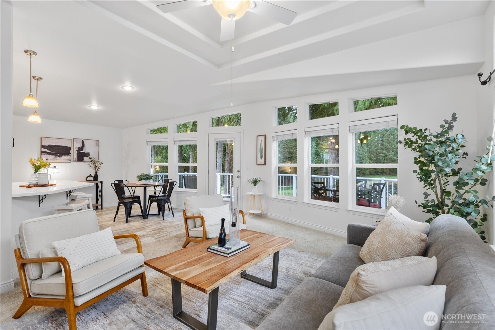 23825 15th Avenue Southeast, Unit 169 Bothell, WA 98021 - Photo 4 of 25 a living room with furniture and a large window
