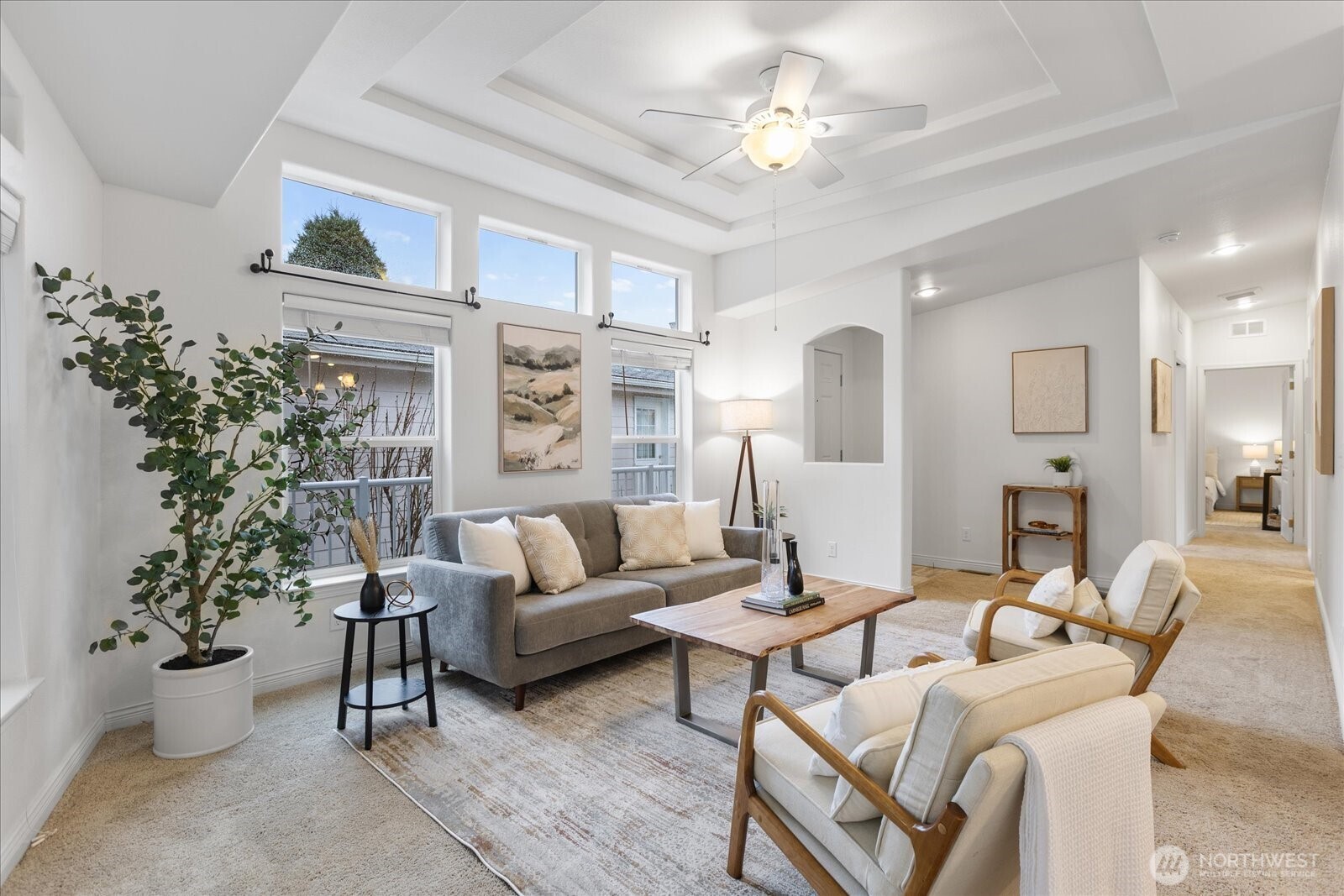 23825 15th Avenue Southeast, Unit 169 Bothell, WA 98021 - Photo 6 of 25 a living room with furniture and a potted plant